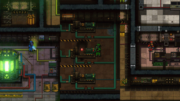 Three crew repairing a machine